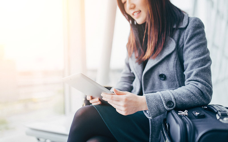 Woman looking at tablet