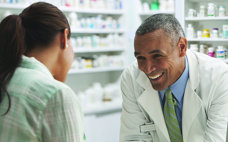 Pharmacist talking to a patient