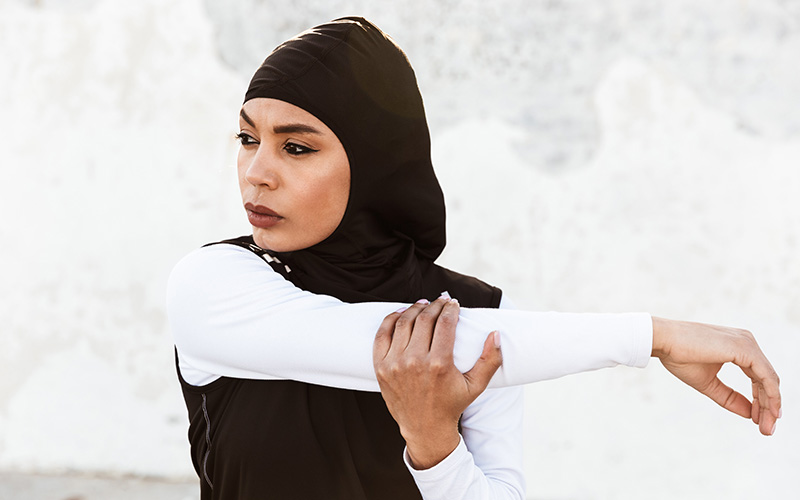 Woman stretching her arm